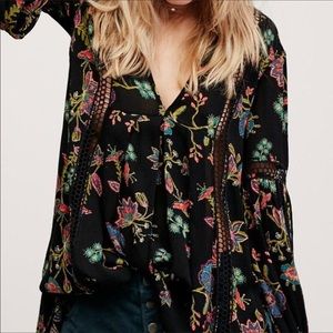 Free People XS tunic long bell sleeves. Black w(pastel pink, green, blue floral